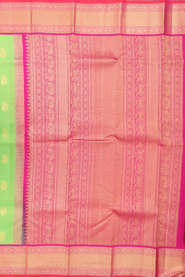 Kanchipuram Silk Saree In Parrot Green With Paisley Buttas