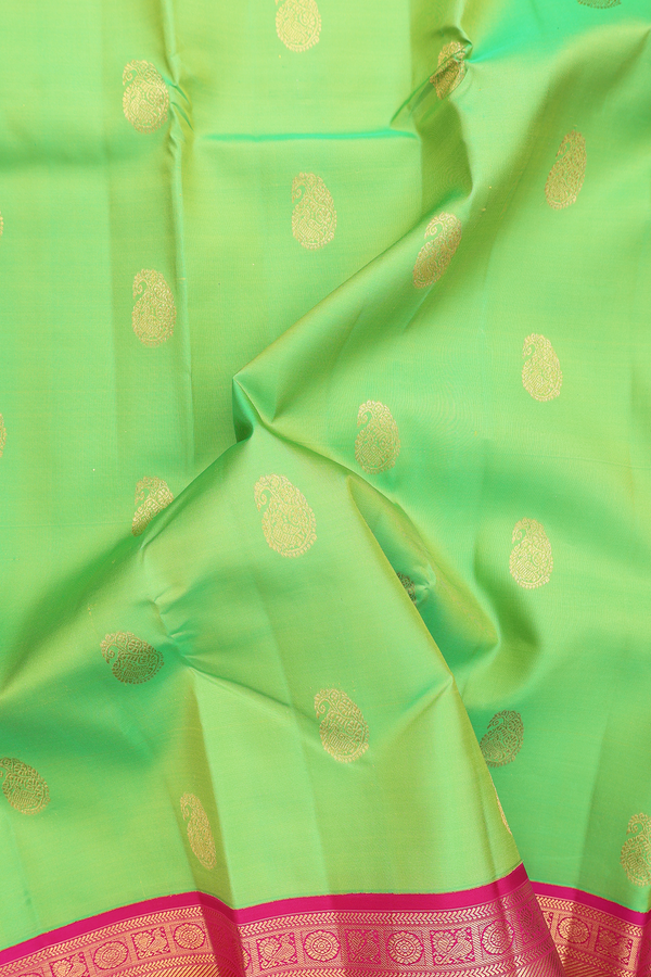 Kanchipuram Silk Saree In Parrot Green With Paisley Buttas