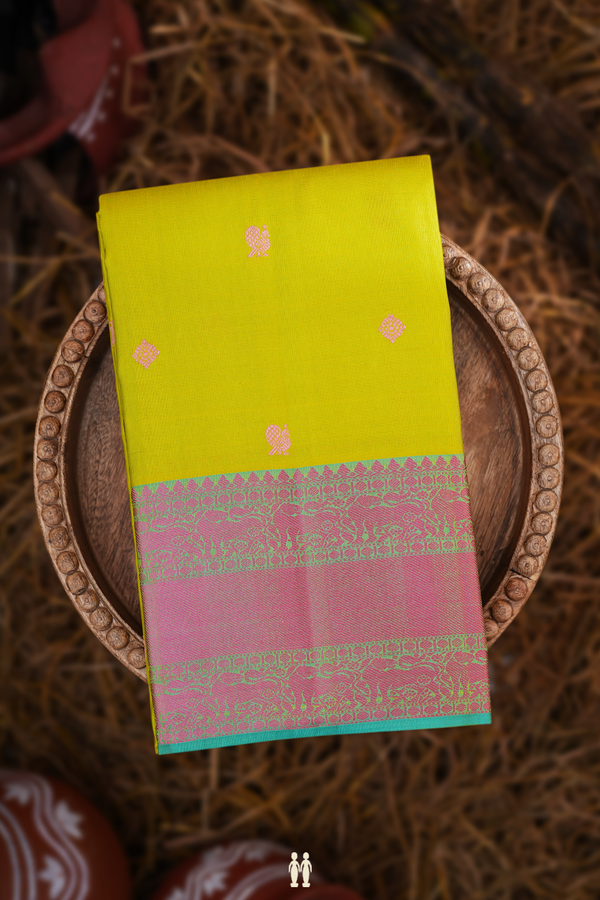 Kanchipuram Silk Saree In Parrot Green With Peacock Buttas