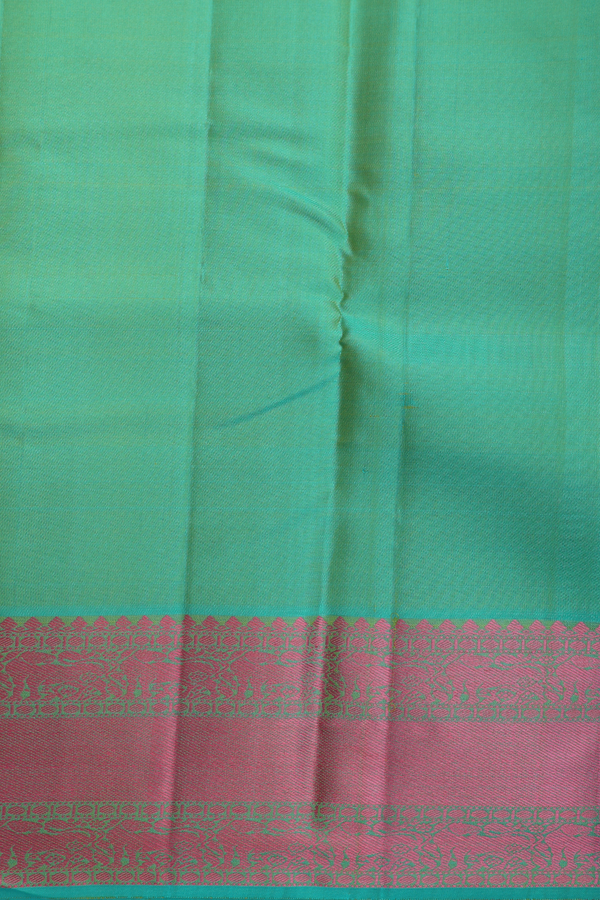 Kanchipuram Silk Saree In Parrot Green With Peacock Buttas