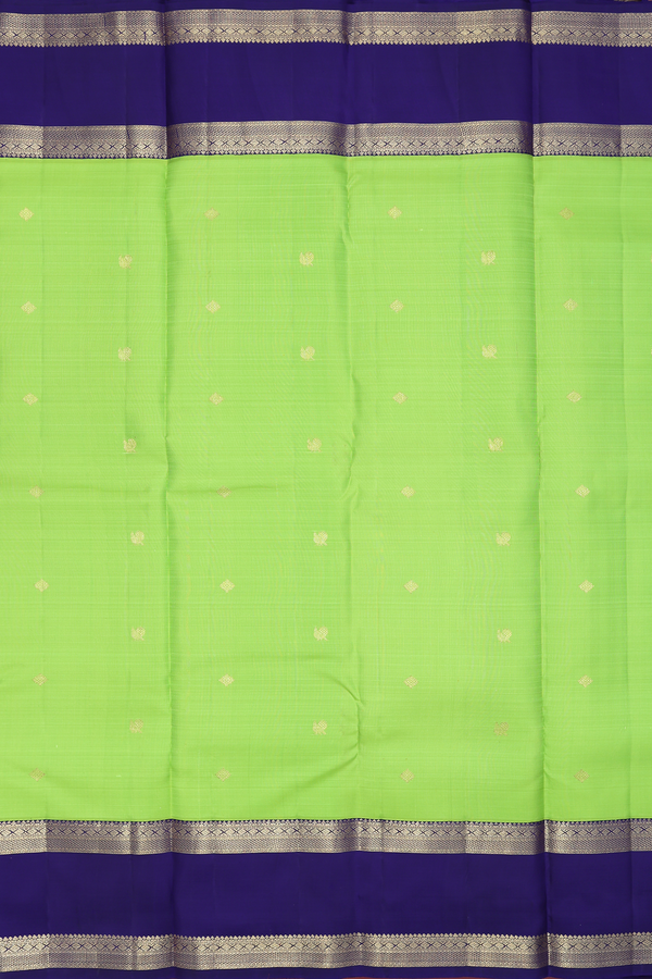 Kanchipuram Silk Saree In Parrot Green With Peacock Buttas