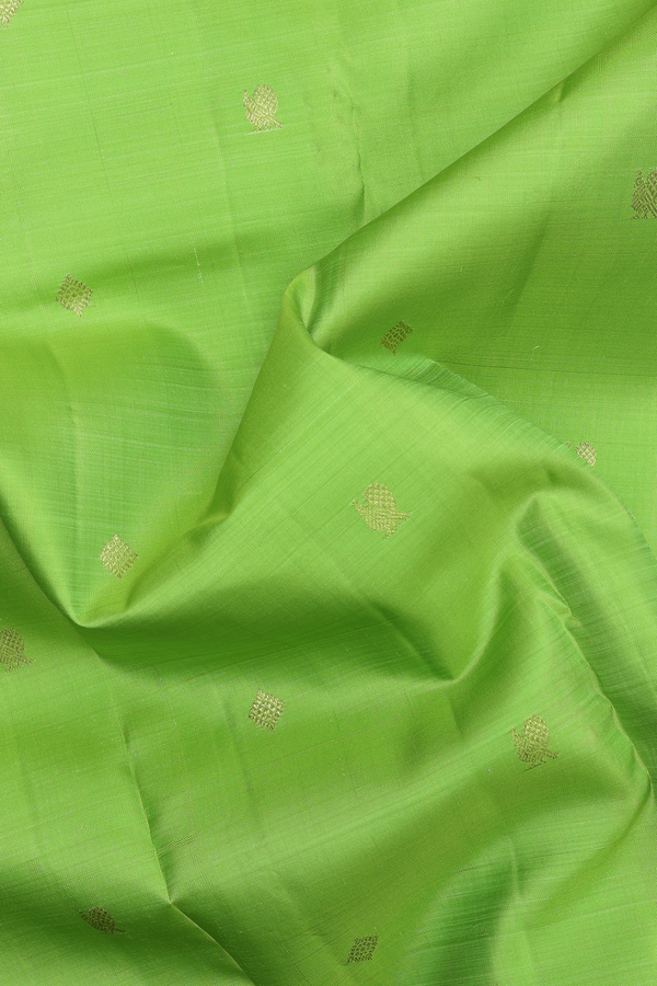Kanchipuram Silk Saree In Parrot Green With Peacock Buttas