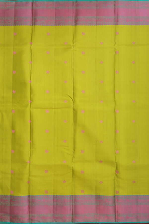 Kanchipuram Silk Saree In Parrot Green With Peacock Buttas