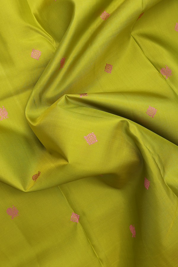 Kanchipuram Silk Saree In Parrot Green With Peacock Buttas
