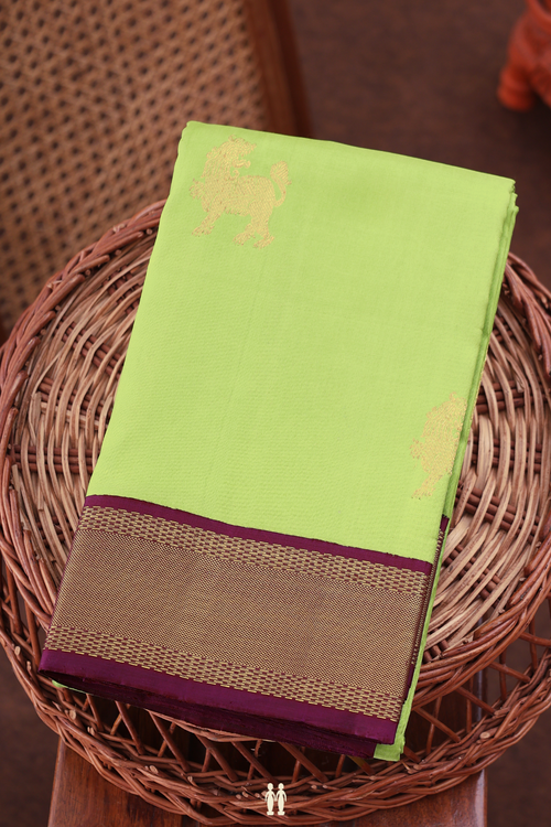 Kanchipuram Silk Saree In Parrot Green With Yazhi Motifs
