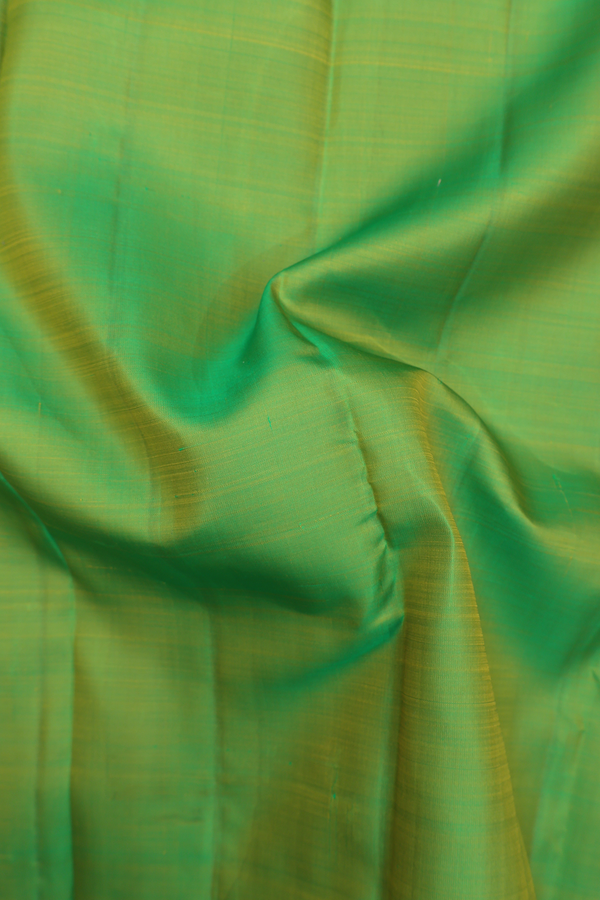 Kanchipuram Silk Saree In Parrot Green With Zari Border