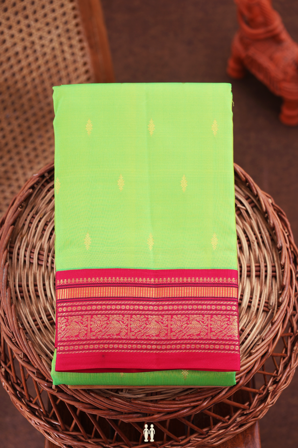 Kanchipuram Silk Saree In Parrot Green With Zari Buttas