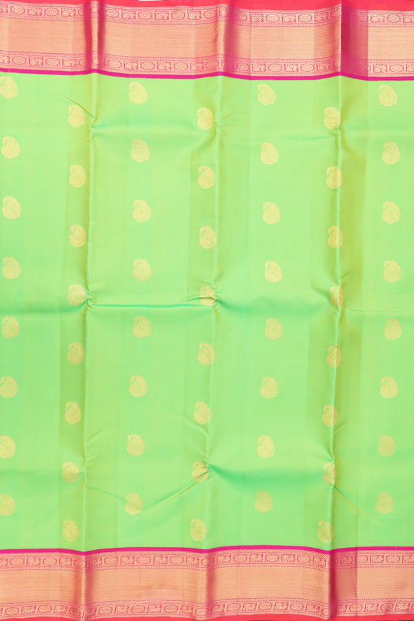Kanchipuram Silk Saree In Parrot Green With Zari Buttas