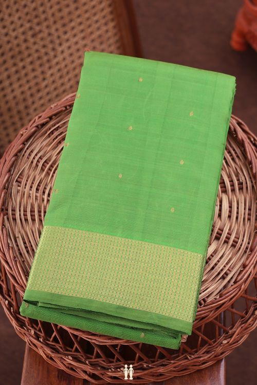 Kanchipuram Silk Saree In Leaf Green With Zari Buttis
