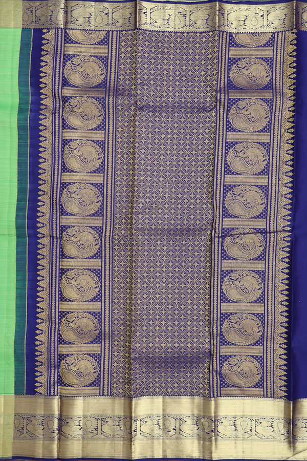 Kanchipuram Silk Saree In Parrot Green With Zari Motifs
