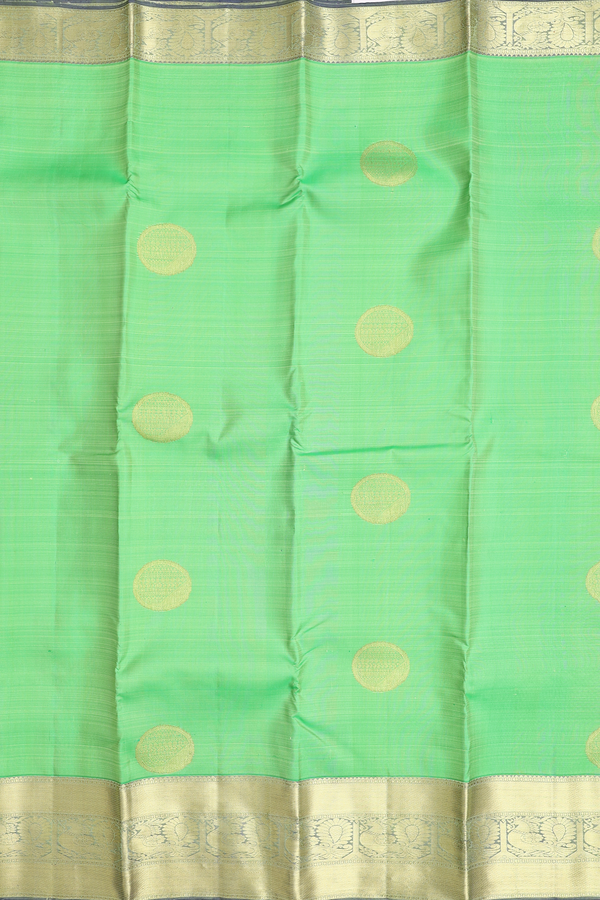 Kanchipuram Silk Saree In Parrot Green With Zari Motifs