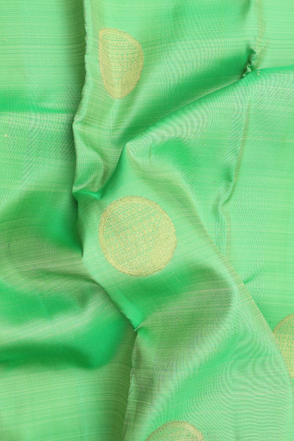 Kanchipuram Silk Saree In Parrot Green With Zari Motifs