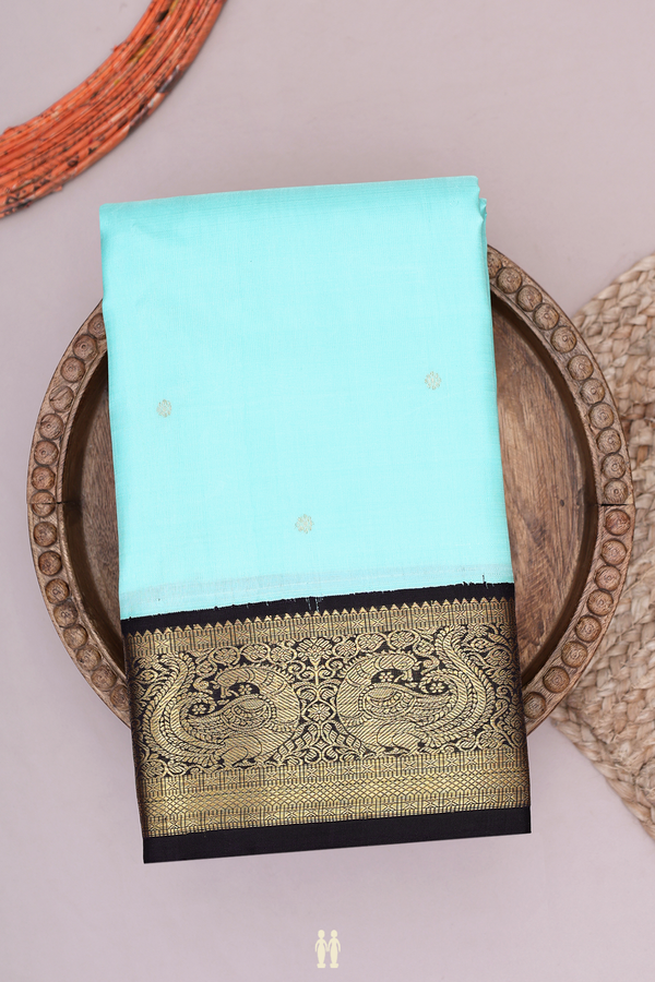 Kanchipuram Silk Saree In Pastel Blue With Floral Buttis
