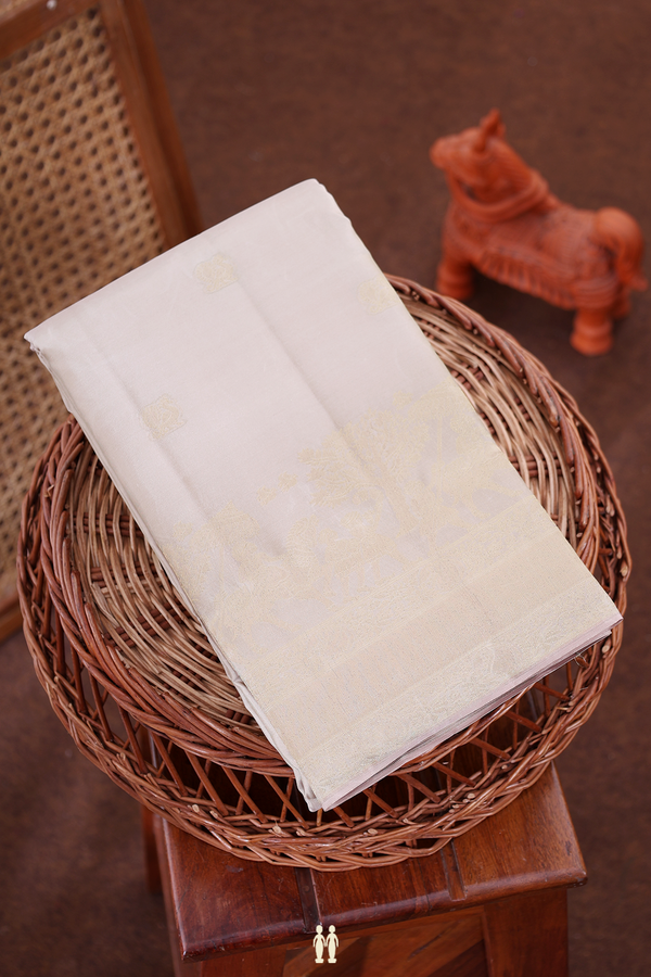 Kanchipuram Silk Saree In Pastel Brown With Peacock Buttas