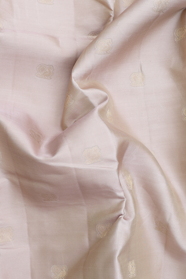Kanchipuram Silk Saree In Pastel Brown With Peacock Buttas