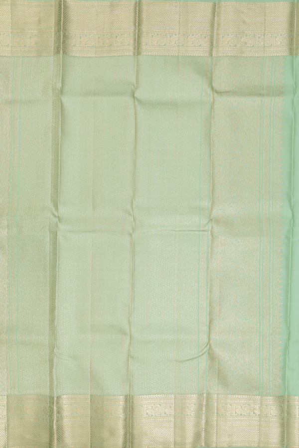 Kanchipuram Silk Saree In Pastel Green With Chakram Buttas