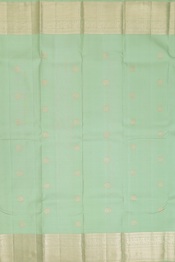 Kanchipuram Silk Saree In Pastel Green With Chakram Buttas