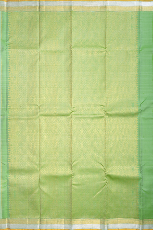 Kanchipuram Silk Saree In Pastel Green With Floral Buttis