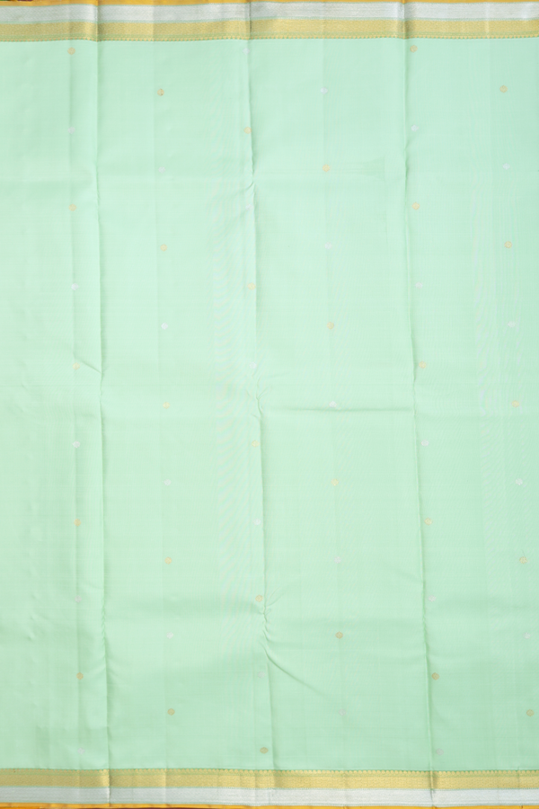 Kanchipuram Silk Saree In Pastel Green With Floral Buttis