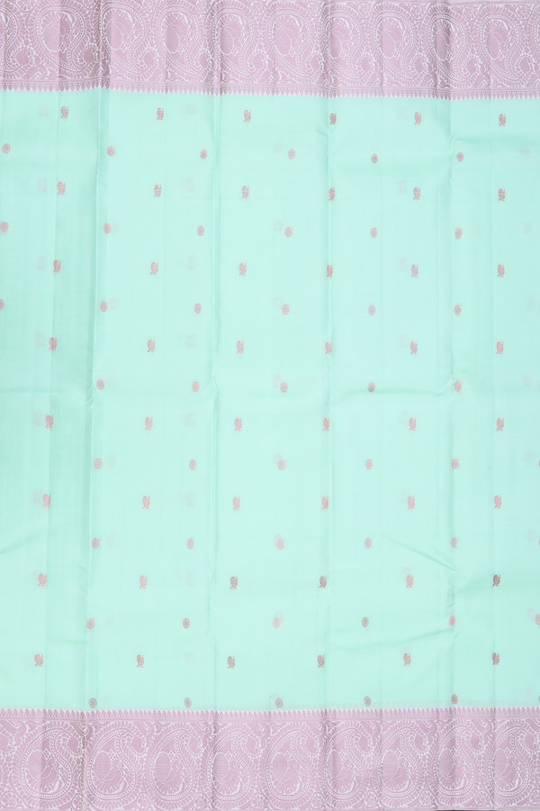 Kanchipuram Silk Saree In Pastel Green With Peacock Buttas