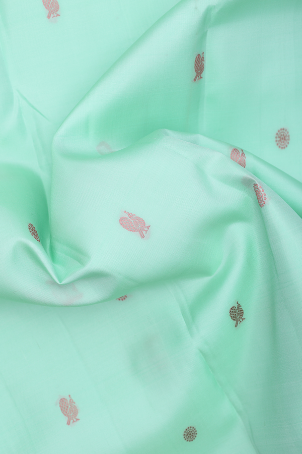 Kanchipuram Silk Saree In Pastel Green With Peacock Buttas