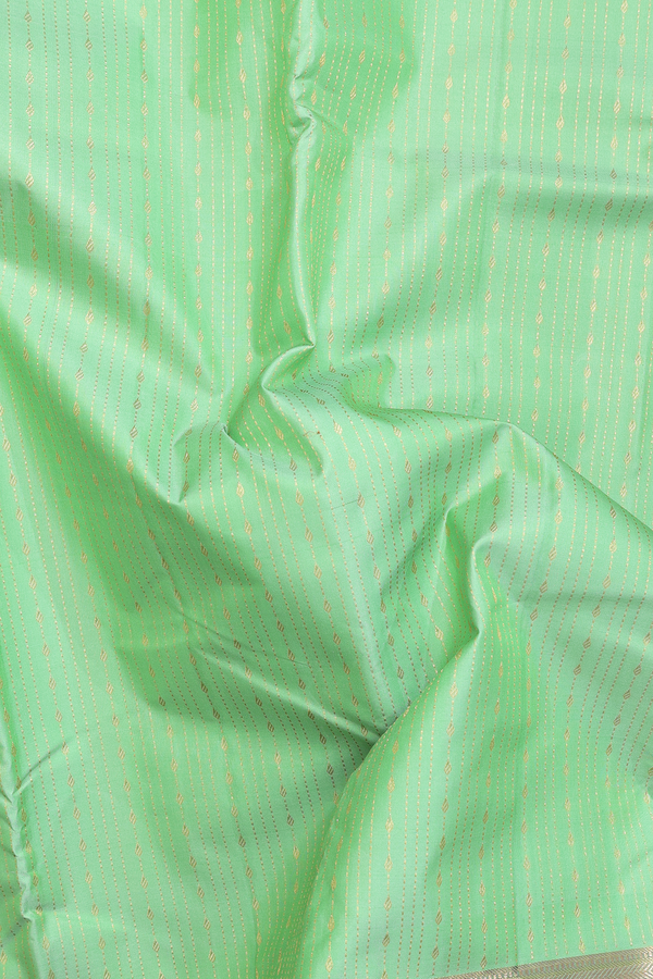 Kanchipuram Silk Saree In Pastel Green With Stripes Design