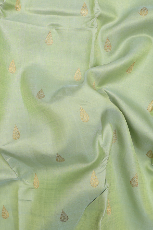 Kanchipuram Silk Saree In Pastel Green With Thilagam Buttas