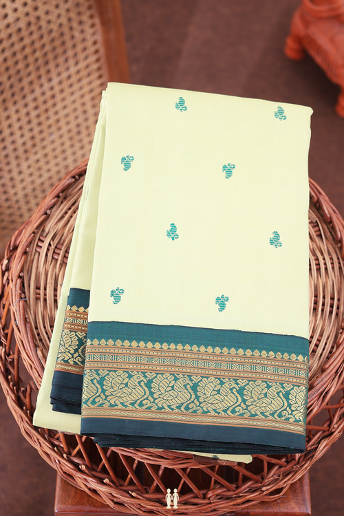 Kanchipuram Silk Saree In Pastel Green With Threadwork Buttis