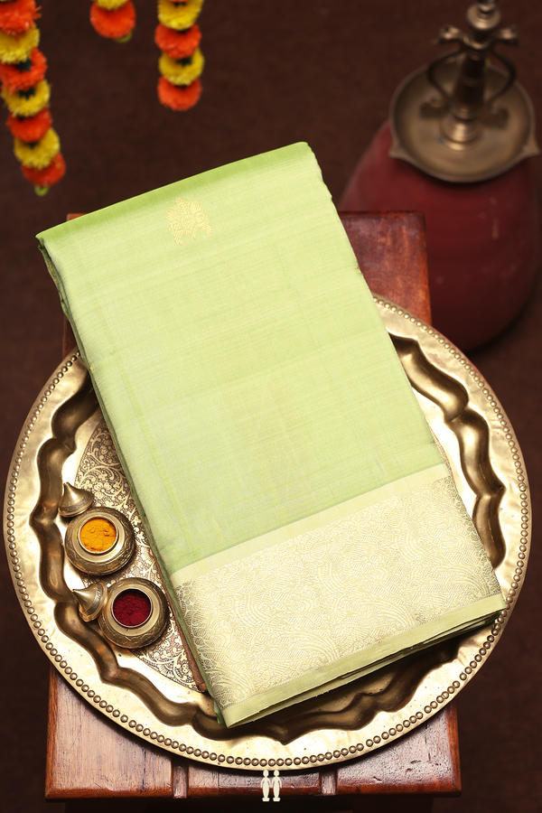 Kanchipuram Silk Saree In Pastel Green With Zari Buttas