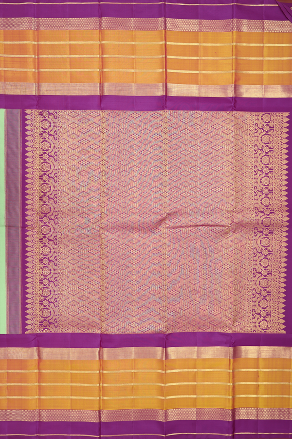 Kanchipuram Silk Saree In Pastel Green With Zari Buttas