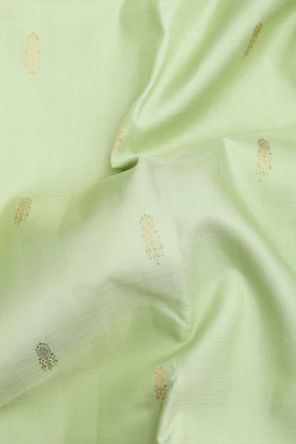 Kanchipuram Silk Saree In Pastel Green With Zari Buttas