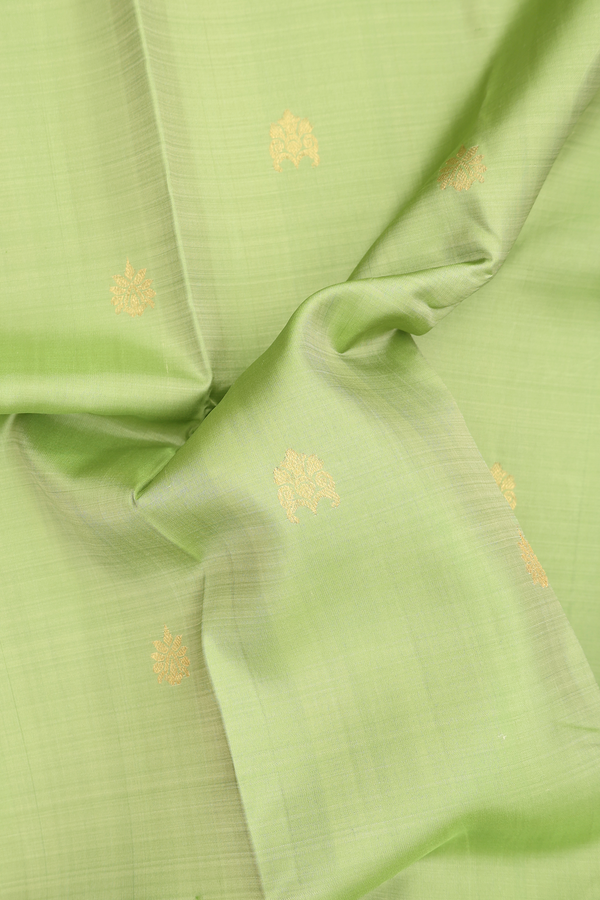 Kanchipuram Silk Saree In Pastel Green With Zari Buttas