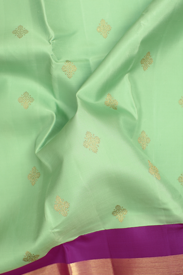 Kanchipuram Silk Saree In Pastel Green With Zari Buttas