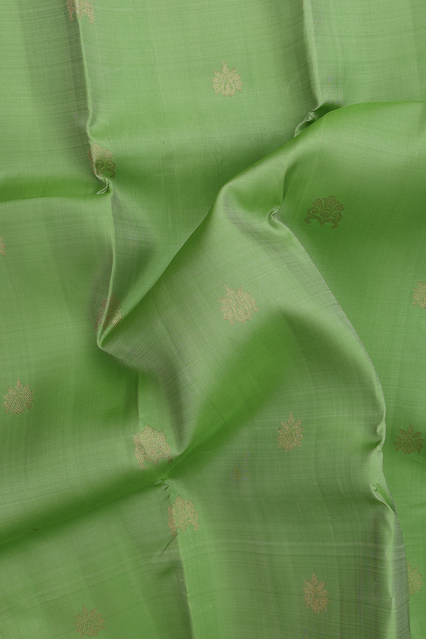 Kanchipuram Silk Saree In Pastel Green With Zari Buttas