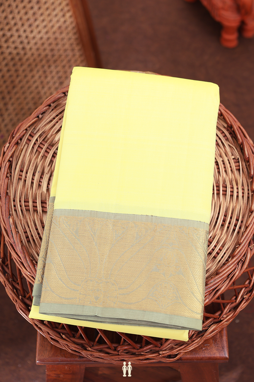Kanchipuram Silk Saree In Pastel Yellow Contrast Border