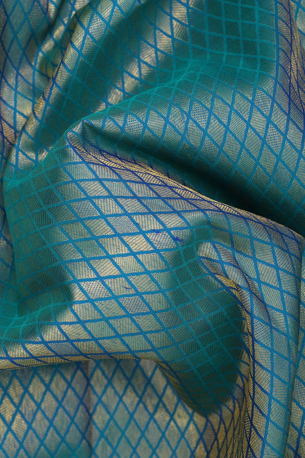 Kanchipuram Silk Saree In Peacock Blue With Brocade Design
