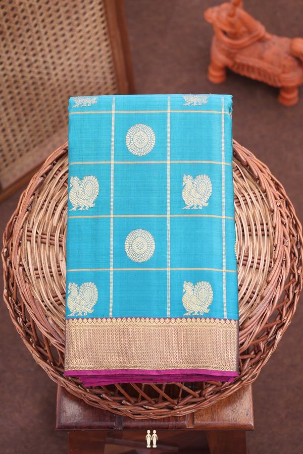 Kanchipuram Silk Saree In Peacock Blue With Checks Along Buttas