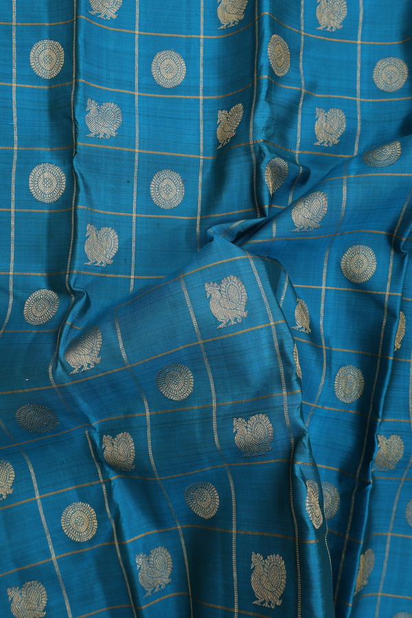 Kanchipuram Silk Saree In Peacock Blue With Checks Along Buttas