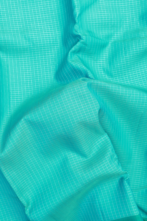 Kanchipuram Silk Saree In Peacock Blue With Checks Design