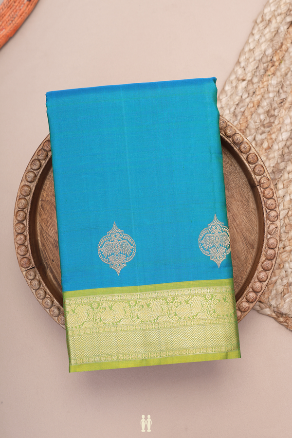 Kanchipuram Silk Saree In Peacock Blue With Contrast Border