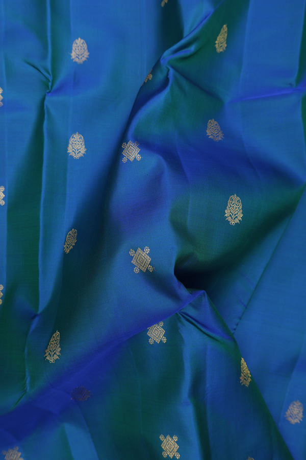 Kanchipuram Silk Saree In Peacock Blue With Floral Buttas