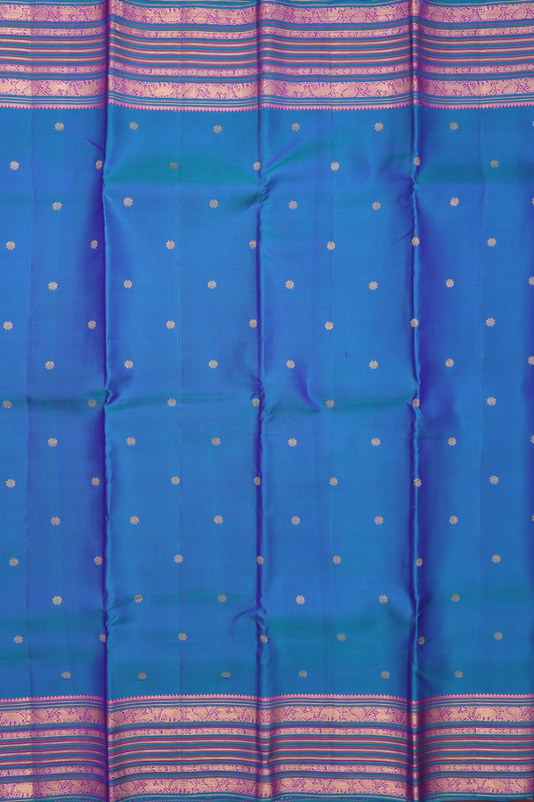 Kanchipuram Silk Saree In Peacock Blue With Floral Buttas