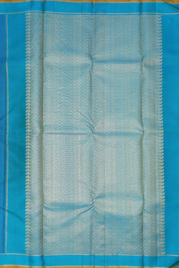 Kanchipuram Silk Saree In Peacock Blue With Floral Buttas