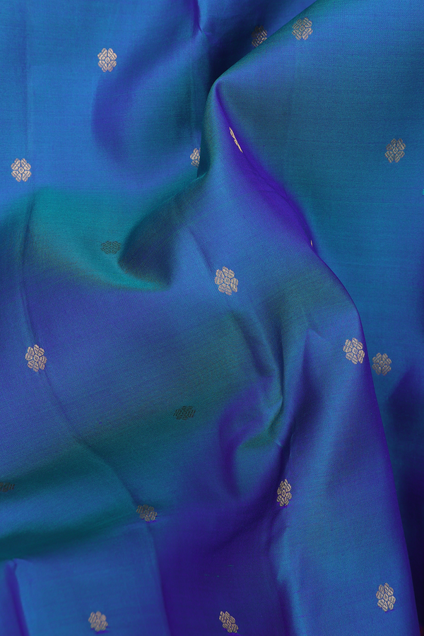 Kanchipuram Silk Saree In Peacock Blue With Floral Buttas