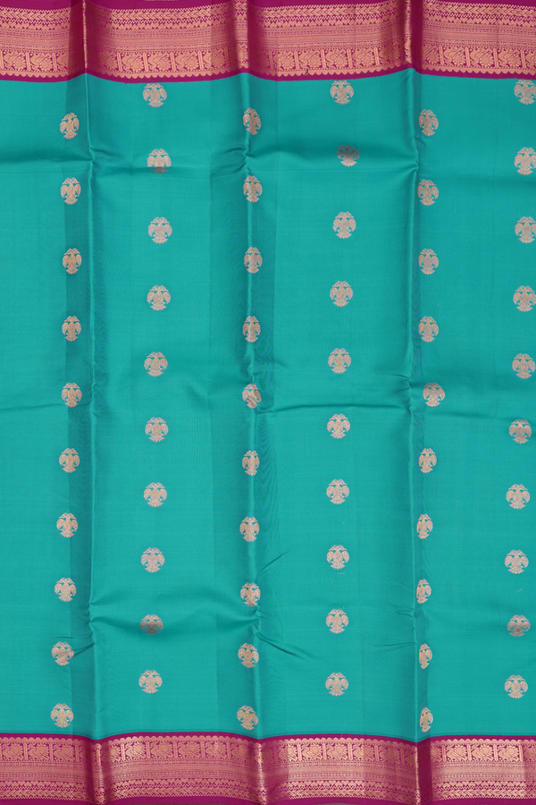 Kanchipuram Silk Saree In Peacock Blue With Iruthalai Pakshi