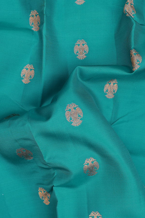 Kanchipuram Silk Saree In Peacock Blue With Iruthalai Pakshi