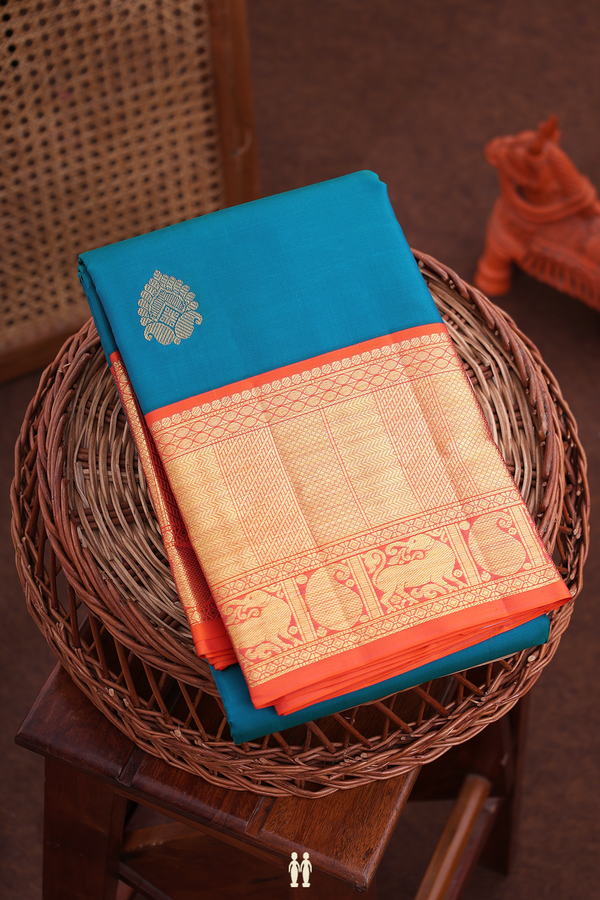 Kanchipuram Silk Saree In Peacock Blue With Paisley Buttas