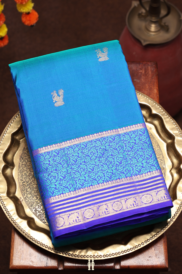 Kanchipuram Silk Saree In Peacock Blue With Peacock Buttas