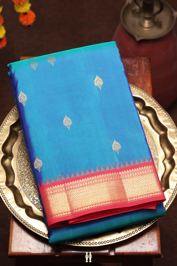 Kanchipuram Silk Saree In Peacock Blue With Zari Buttas