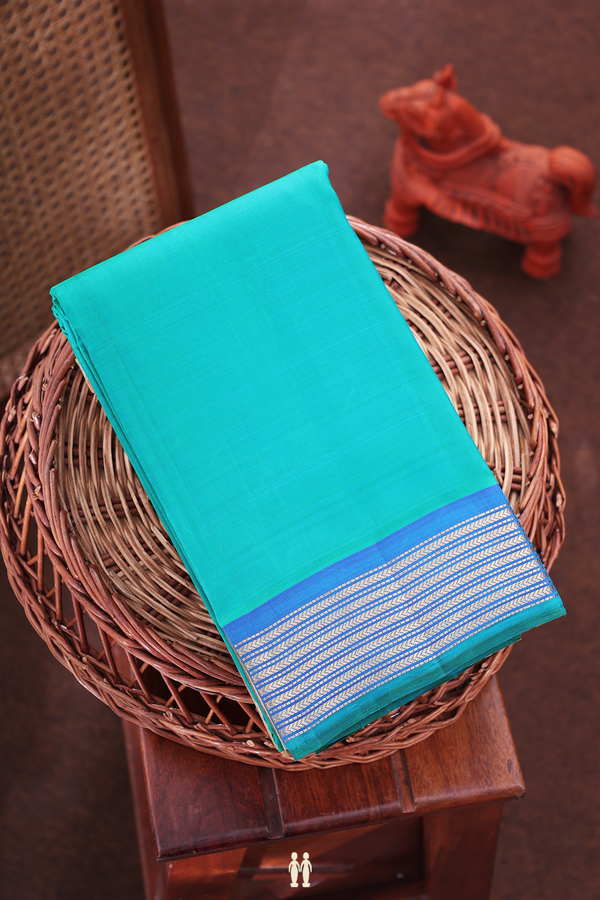 Kanchipuram Silk Saree In Peacock Green With Contrast Border